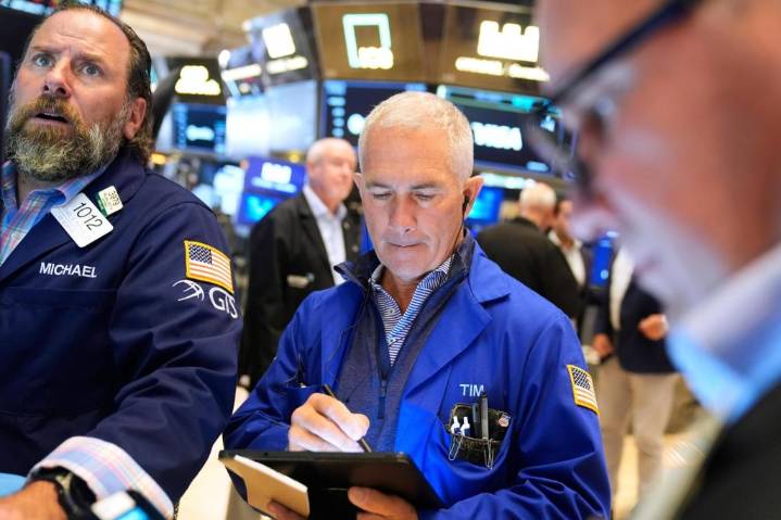 Wall Street holds steady following the latest signals that the job market is slowing