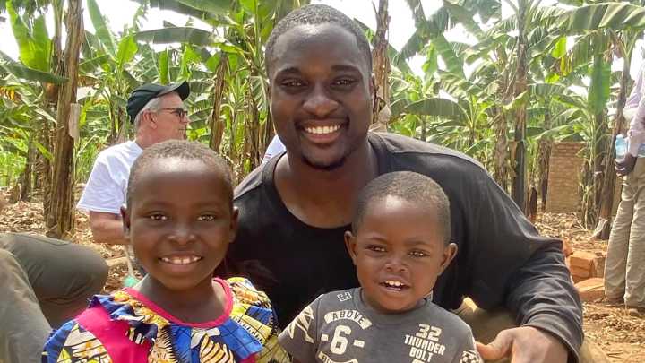 College football star returns to Uganda after being adopted age 3 with parents battling AIDS