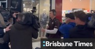 Ginnivan swarmed at Adelaide airport by media
