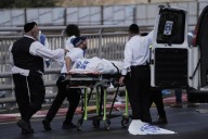 Palestinian gunmen open fire at Jerusalem bus stop, killing 6