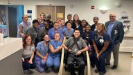 Teen becomes only second person in the US to survive rare heart surgery, leave hospital