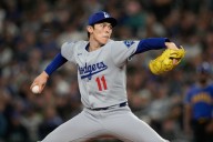 Dodgers hold off Mariners while resting regulars