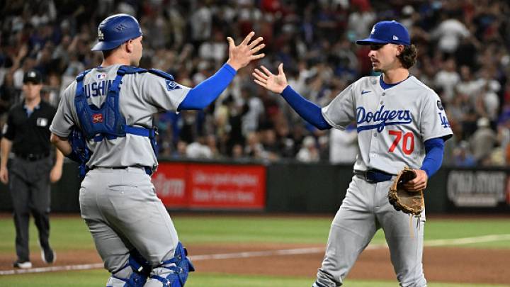 Dodgers bullpen blows another lead, but rallies in extra innings to beat D