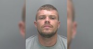 Thug spat at bar staff and tried to bite worker's leg