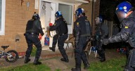 Three doors were bashed in, six people left in handcuffs