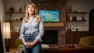 Democrat Sarah Trone Garriott speaks after Des Moines town hall