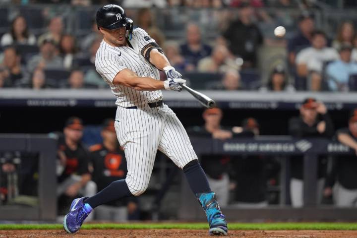 Stanton has pair of 2-run homers, Judge hits 52nd, Yanks beat Orioles to stay tied for AL East lead