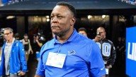 Barry Sanders flexes with Eminem photo during Lions