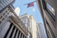 Asian shares are mostly higher after Wall Street’s record week