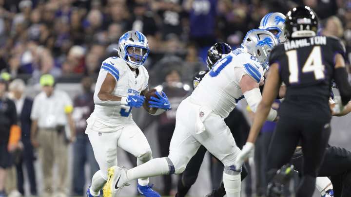 Lions drive 96 yards for a 28-21 lead, scoring on fourth down