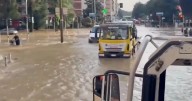 Italy floods: Storms drown holiday hotspots as people trapped in cars and kids rescued
