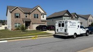 A fire, man shot by police and a woman found dead: GBI outlines what unfolded at home in Locust Grove