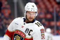 Panthers' Aleksander Barkov helped off ice after suffering injury at training camp