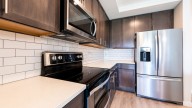 How To Clean Under Your Kitchen Appliances (Without Moving Them)