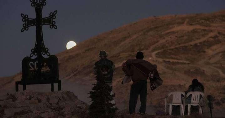 Photos show the lunar eclipse across Asia and Europe