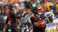 The anti-Lambeau Leap: Andre Szmyt hops into Dawg Pound as Browns hero