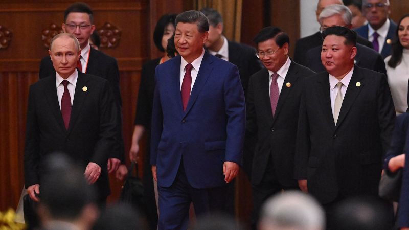 Experts see fissures despite Xi, Putin and Kim’s show of unity