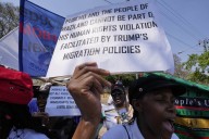 Eswatini activists protest US deportation deal at embassy in South Africa