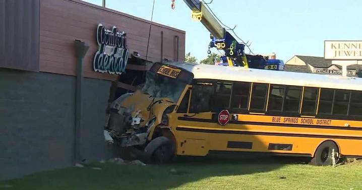 Driver, 3 students injured when school bus crashes into building in suburban Kansas City