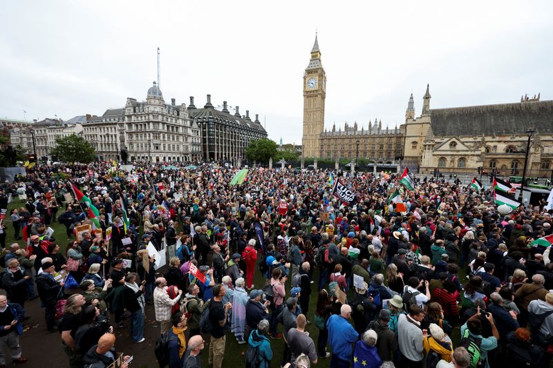 Anti-Trump protesters march through London as president basks in royal welcome