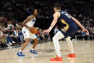 Timberwolves re-sign Bones Hyland