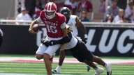 Mendoza's 4 TD passes power No. 23 Indiana to a 56