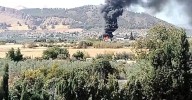 Un autobús con un equipo deportivo se incendia en la A