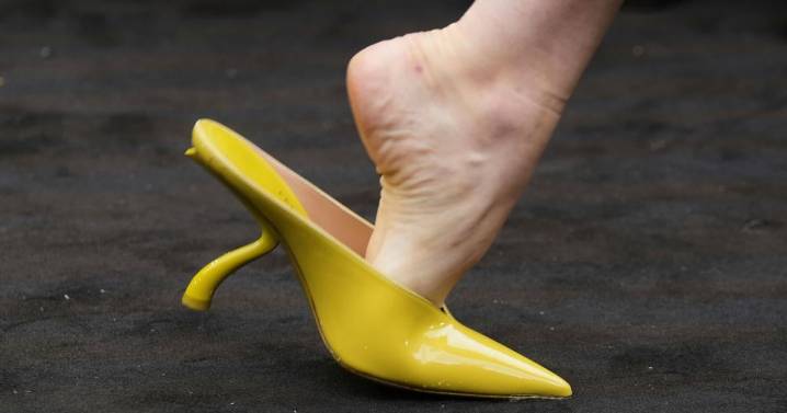 Ferragamo's chartreuse bags and shoes pop against 1920s