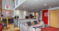 Stunning loft-style flat tucked away in Plymouth used as 'successful Airbnb' on the market for £210k