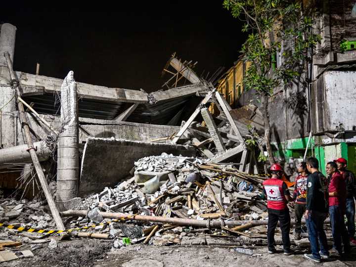 Dozens trapped in deadly Indonesia school collapse