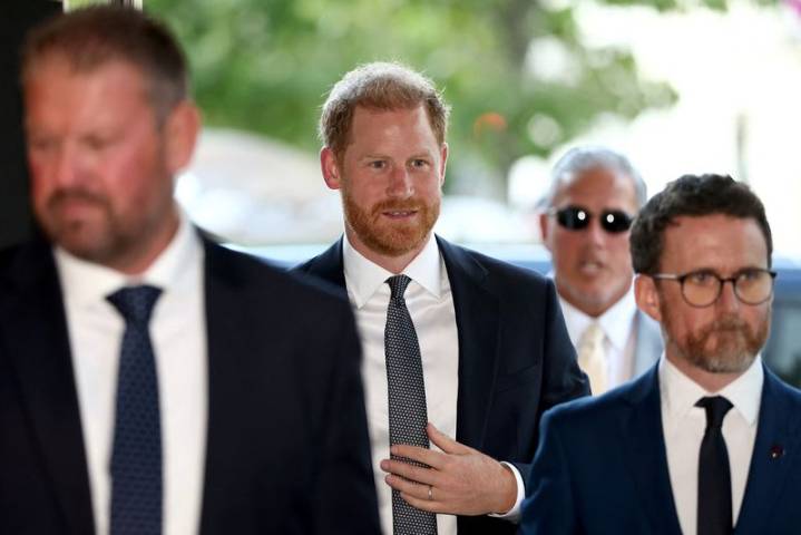 World has thrown challenges, Prince Harry says on return to UK