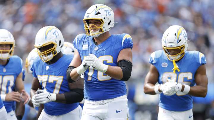 Charges OT Joe Alt carted off in first quarter