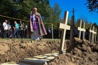 Poland buries wartime remains in western Ukraine as part of reconciliation