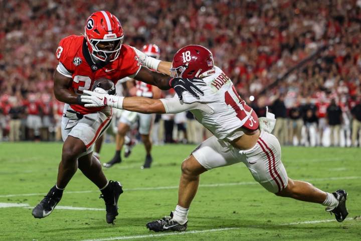 Simpson accounts for 3 TDs as No. 17 Alabama never trails and beats No. 5 Georgia 24