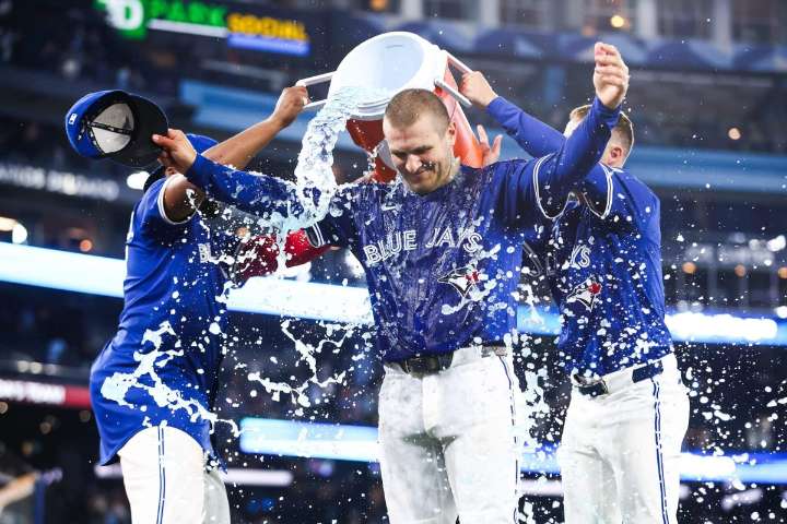 Daulton Varsho's grand slam awakens Blue Jays offence, setting up crucial final weekend