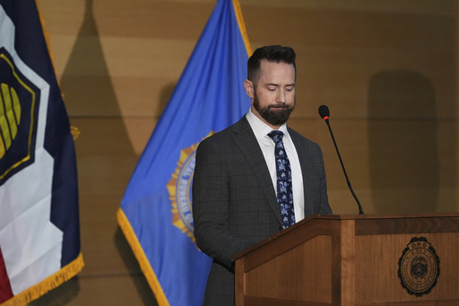 The Latest: FBI releases photos of a person of interest in Kirk assassination