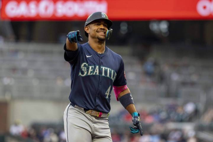 Rodríguez hits 2 homers, Raleigh gets his 52nd, and Mariners down Braves 10