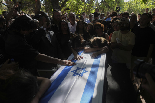 Strikes across Gaza kill at least 31 as international scholars accuse Israel of genocide