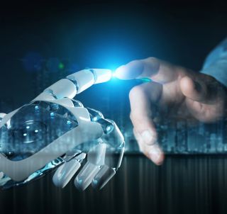 How to Help People Adapt to the AI-Centered Workplace