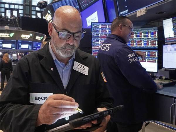 U.S. stocks churn amid uncertainty about rate cuts from the Fed
