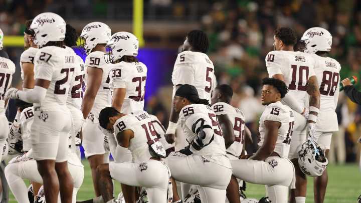 Texas A&M stars pray for Bryce Anderson on field after horror injury sees him stretchered off during Notre Dame game