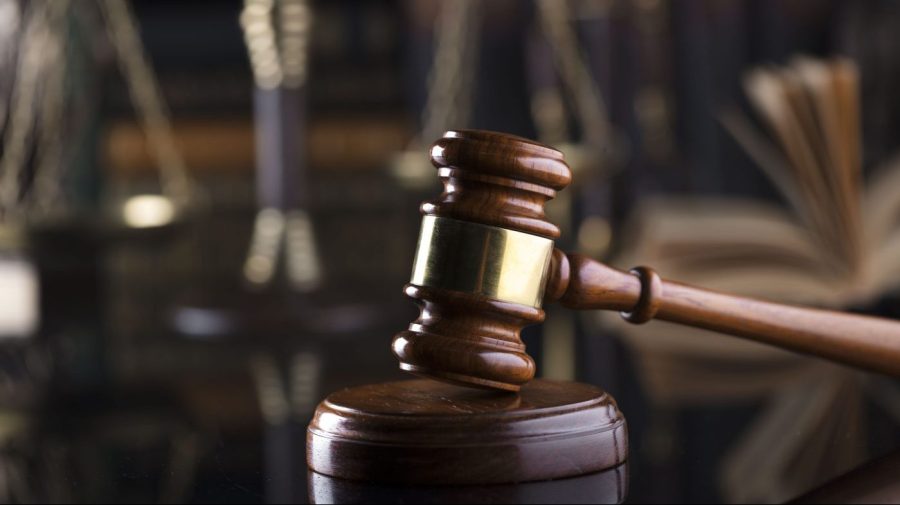 Man sentenced to prison after killing friend, stuffing him into trash can