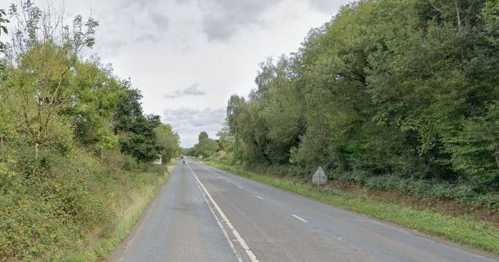 Two trapped after car careers off Devon road and crashes into field
