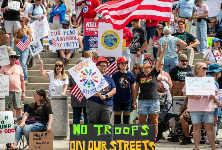 ‘Tax the rich’: Protestors take to the Capitol steps