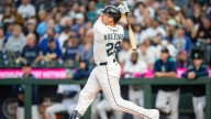 Mariners fan who caught Cal Raleigh's 60th home run ball is going viral for all the right reasons