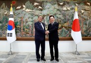 Japan and South Korea leaders commit to closer ties in their final summit