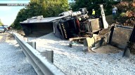 Firefighters respond to overturned gravel truck in Raynham