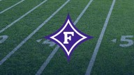 Furman holds off Campbell, 28