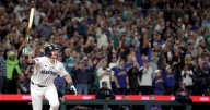 Cal Raleigh's 60th dinger sparks a chain of feel-good events ending with the ball in No. 29's hands