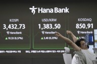 Asian shares mostly climb after US stocks remained near record levels following the Fed’s rate cut